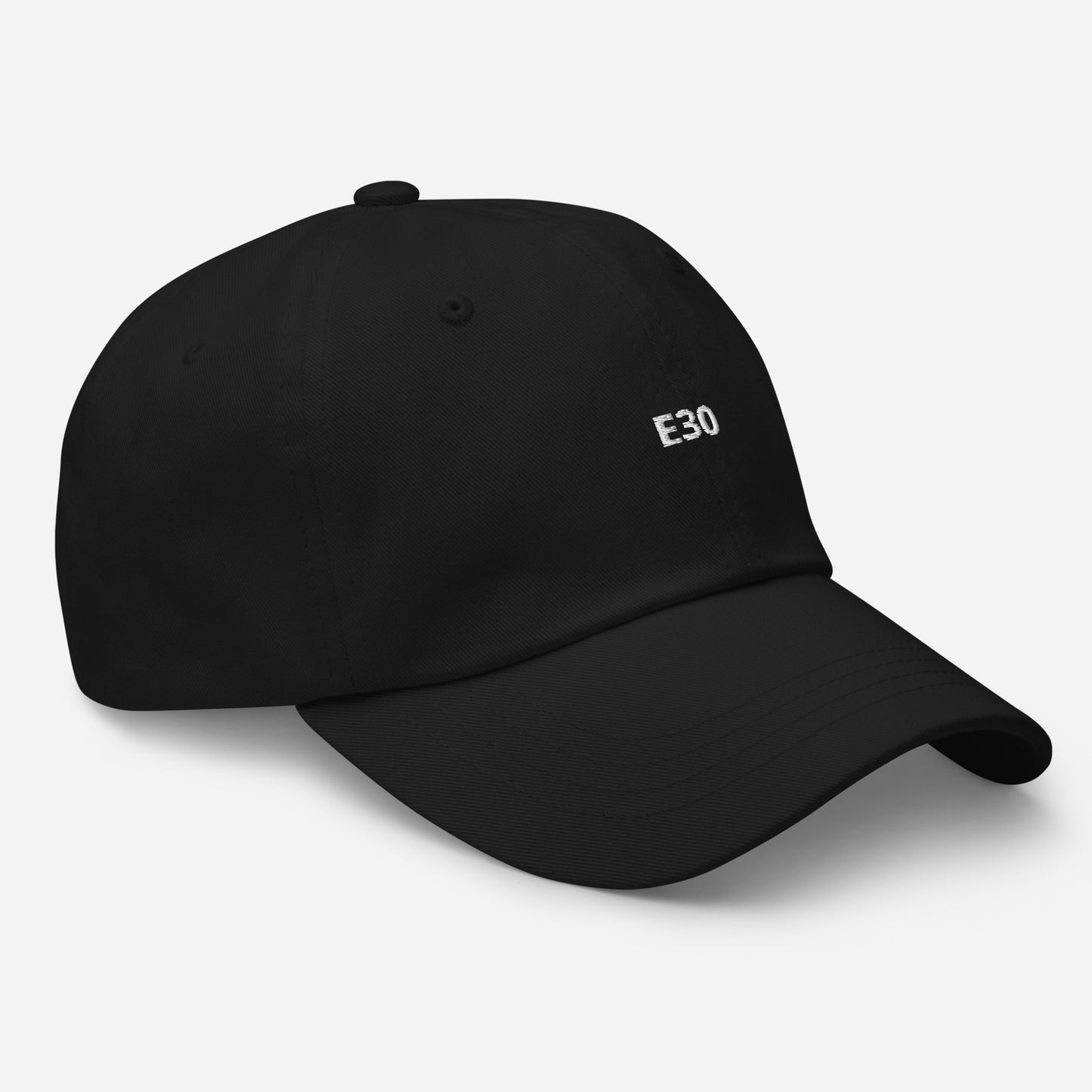 a black hat with the BMW Chassis E30 embroidered on it