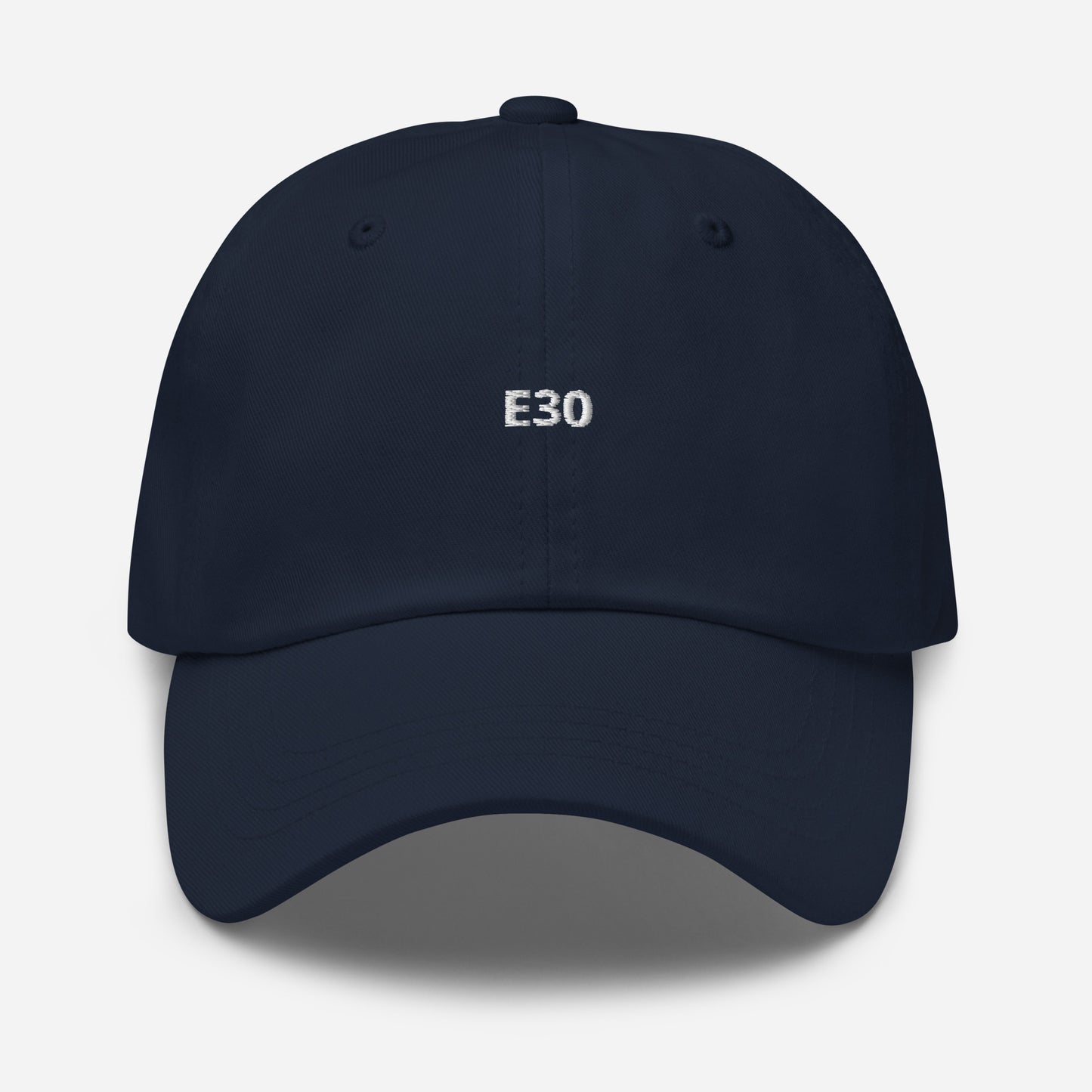 a baseball cap with the BMW Chassis E30 embroidered on it