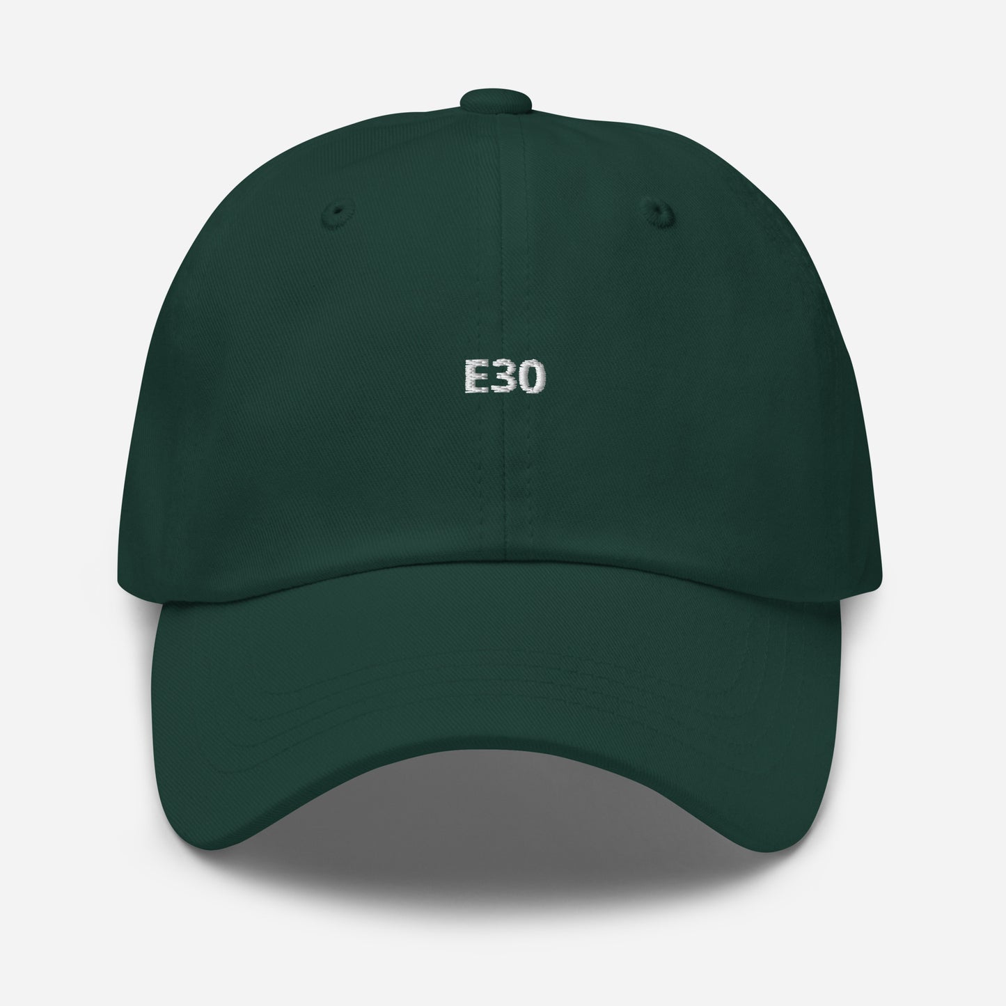 a green hat with the BMW Chassis E30 embroidered on it
