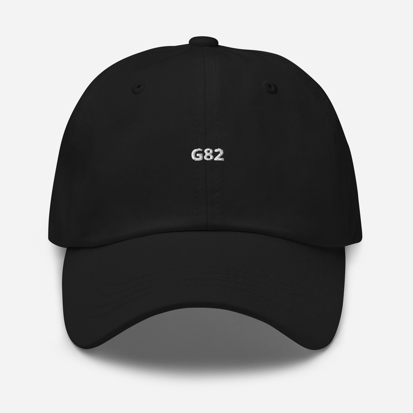 a black baseball cap with the BMW Chassis G82 embroidered on it